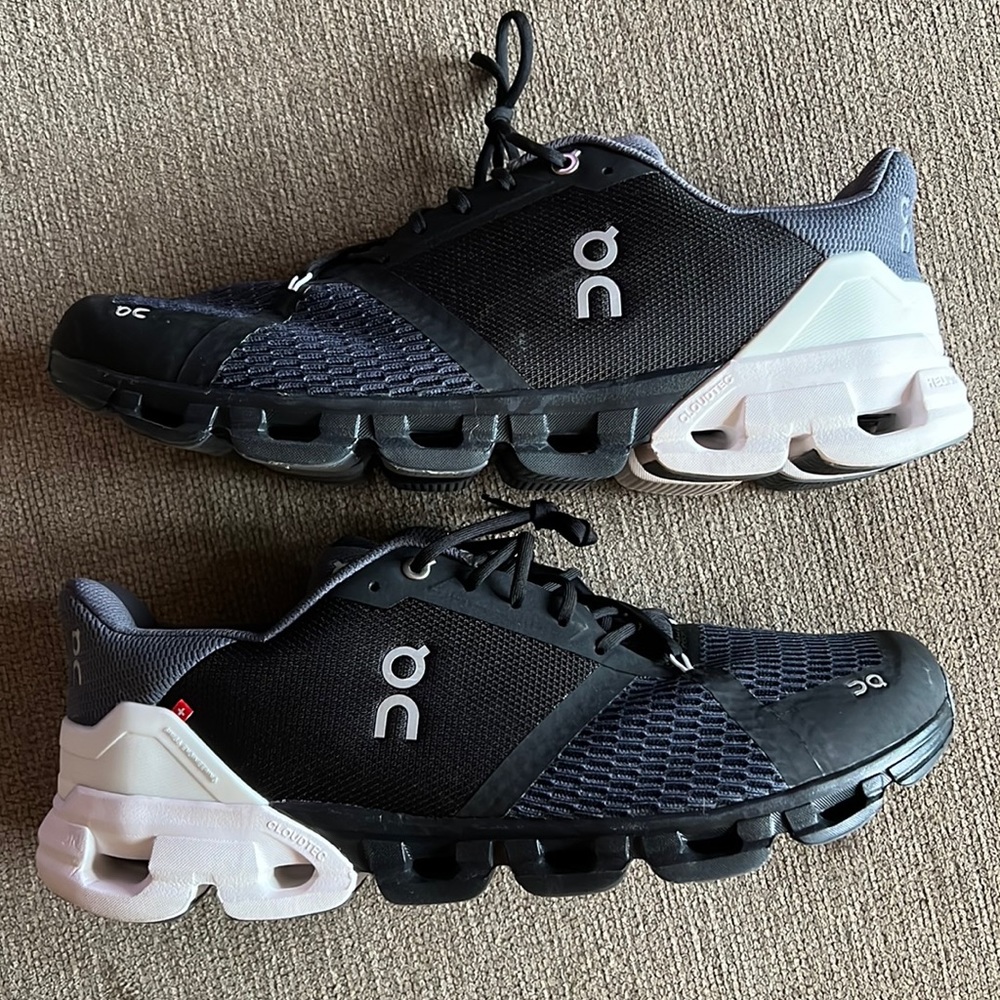 On running gray and white shoes